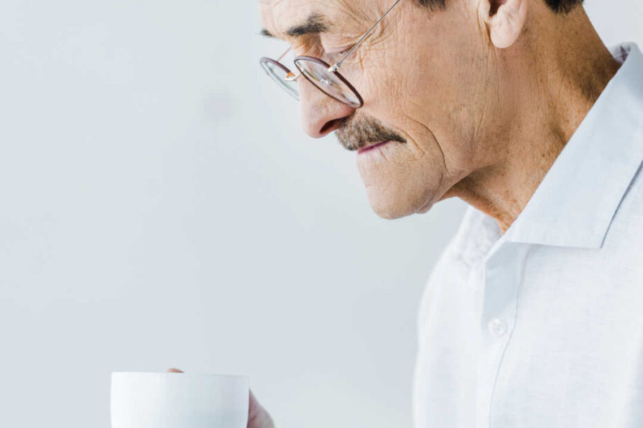 older man drinking coffee