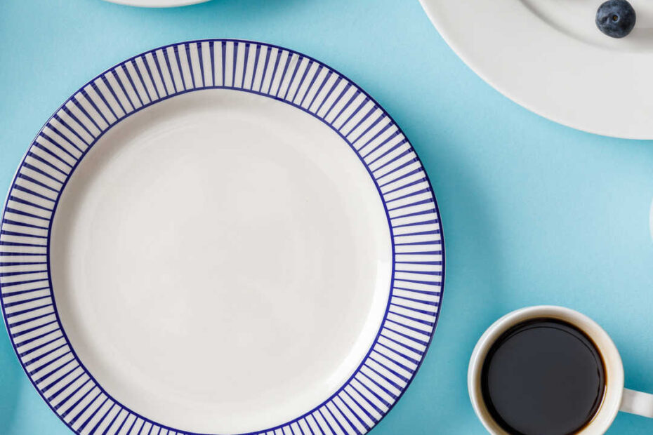 coffee with an empty plate