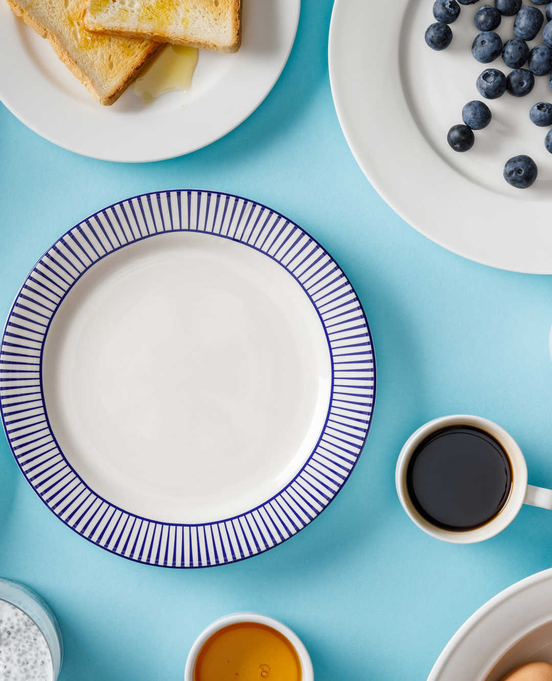 coffee with an empty plate