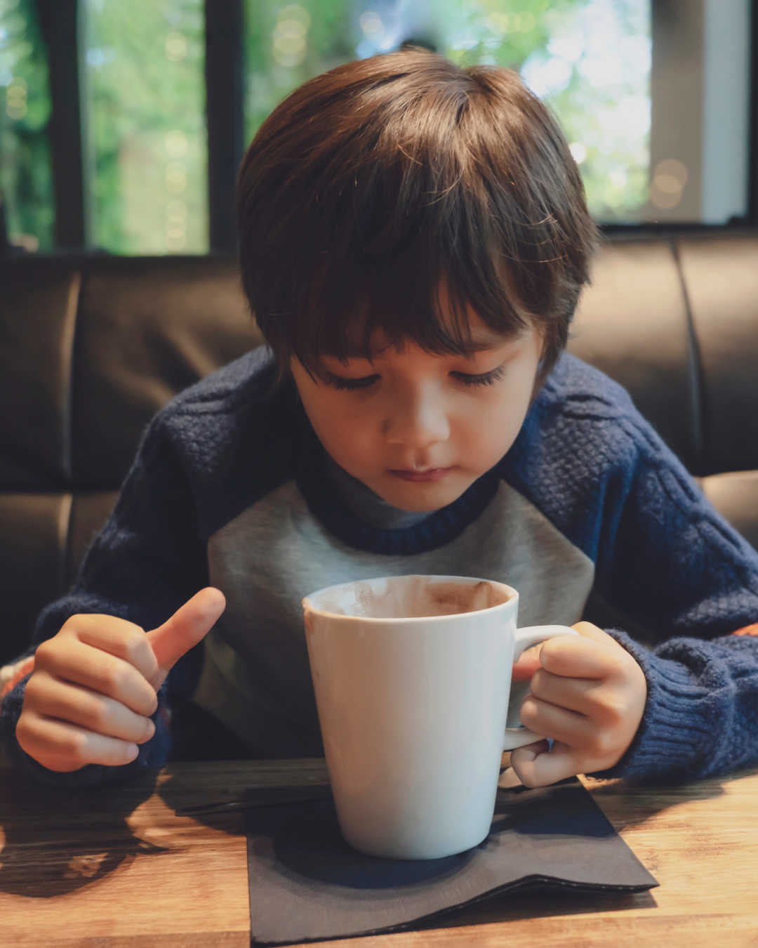 boy drinking coffee