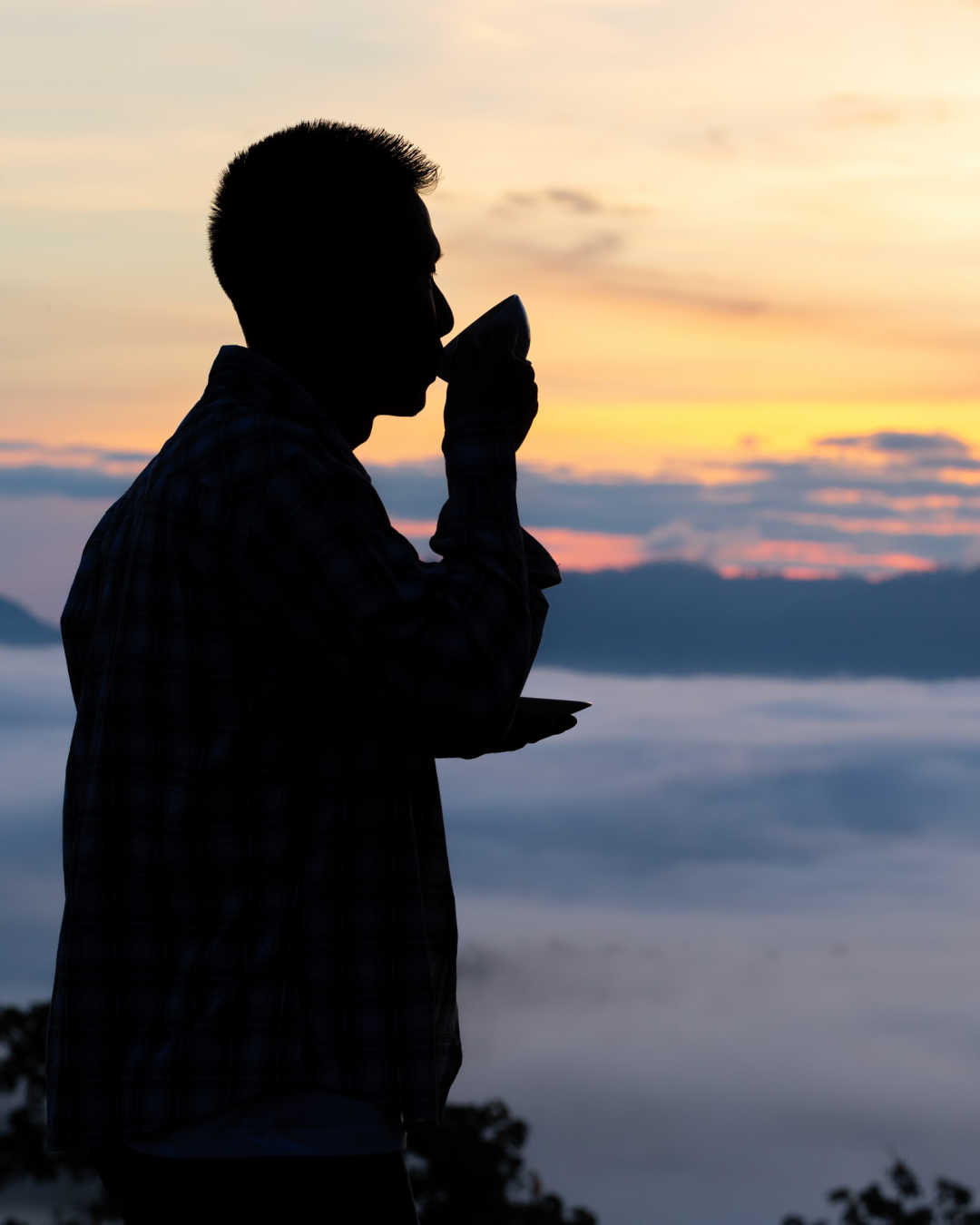 drinking coffee at sunset