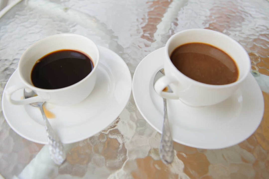 2 slightly different cups of coffee