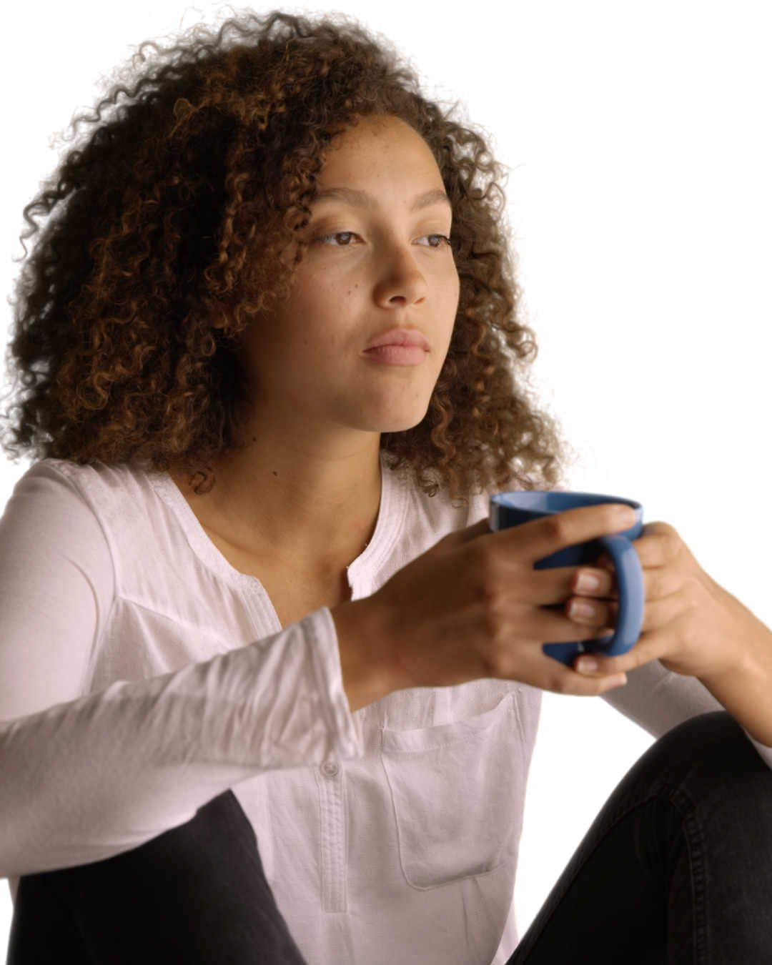 thoughtful woman drinking coffee