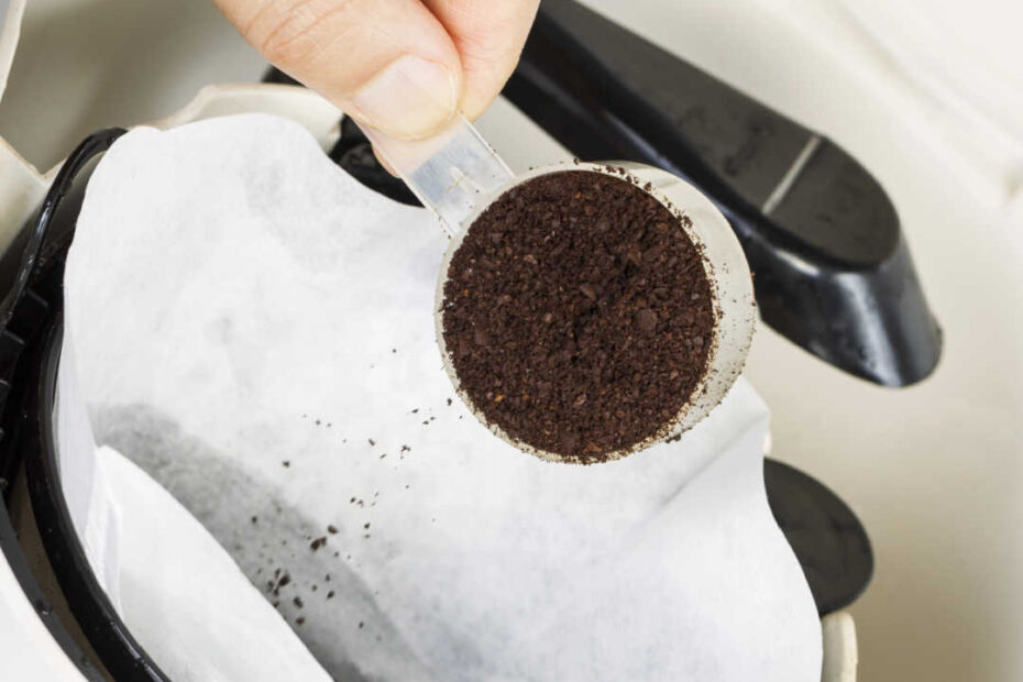 pouring coffee into paper filter